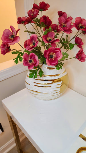 White ceramic vase with gold texture