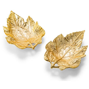 2 Golden Metal Leaves on table
