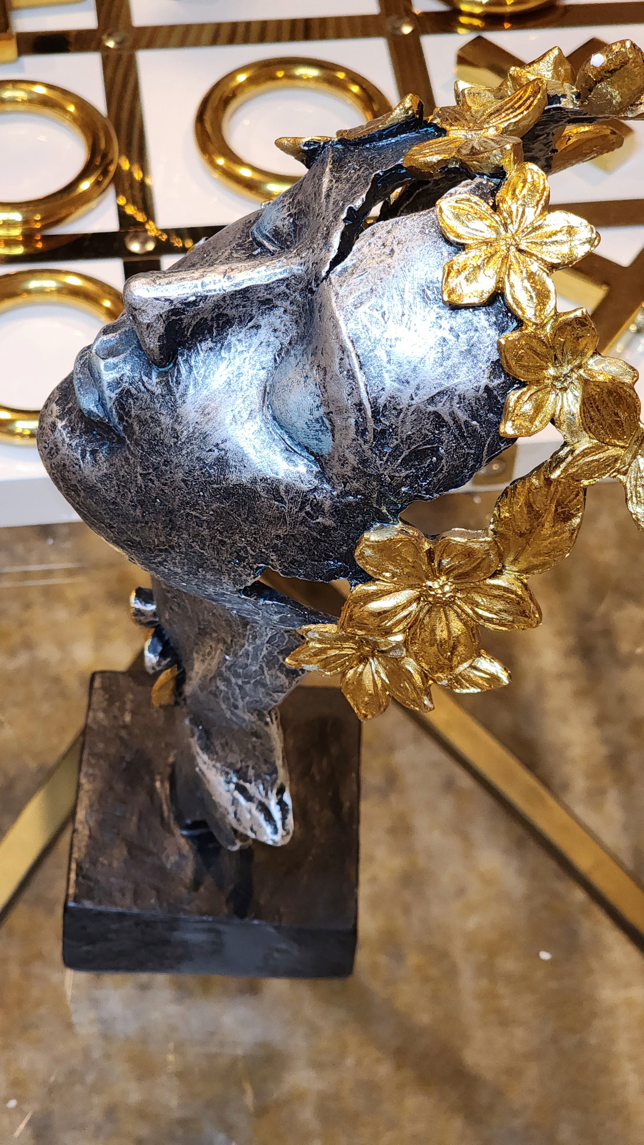 Butterfly Lady Gold and Black Face Statue shown from a side that looks great