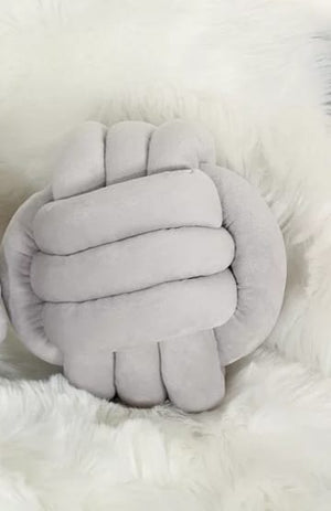 Stylish velvet knot pillow with a unique texture and knot detail