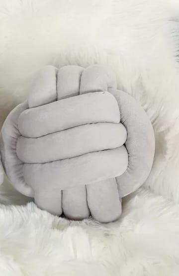 Stylish velvet knot pillow with a unique texture and knot detail