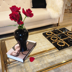 Small curvy black vase