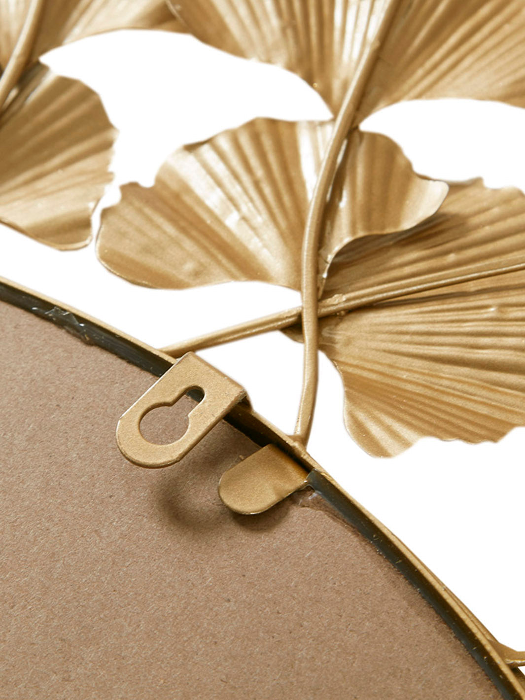 Leaf Decor Mirror the side of the mirror that shows the grip of that