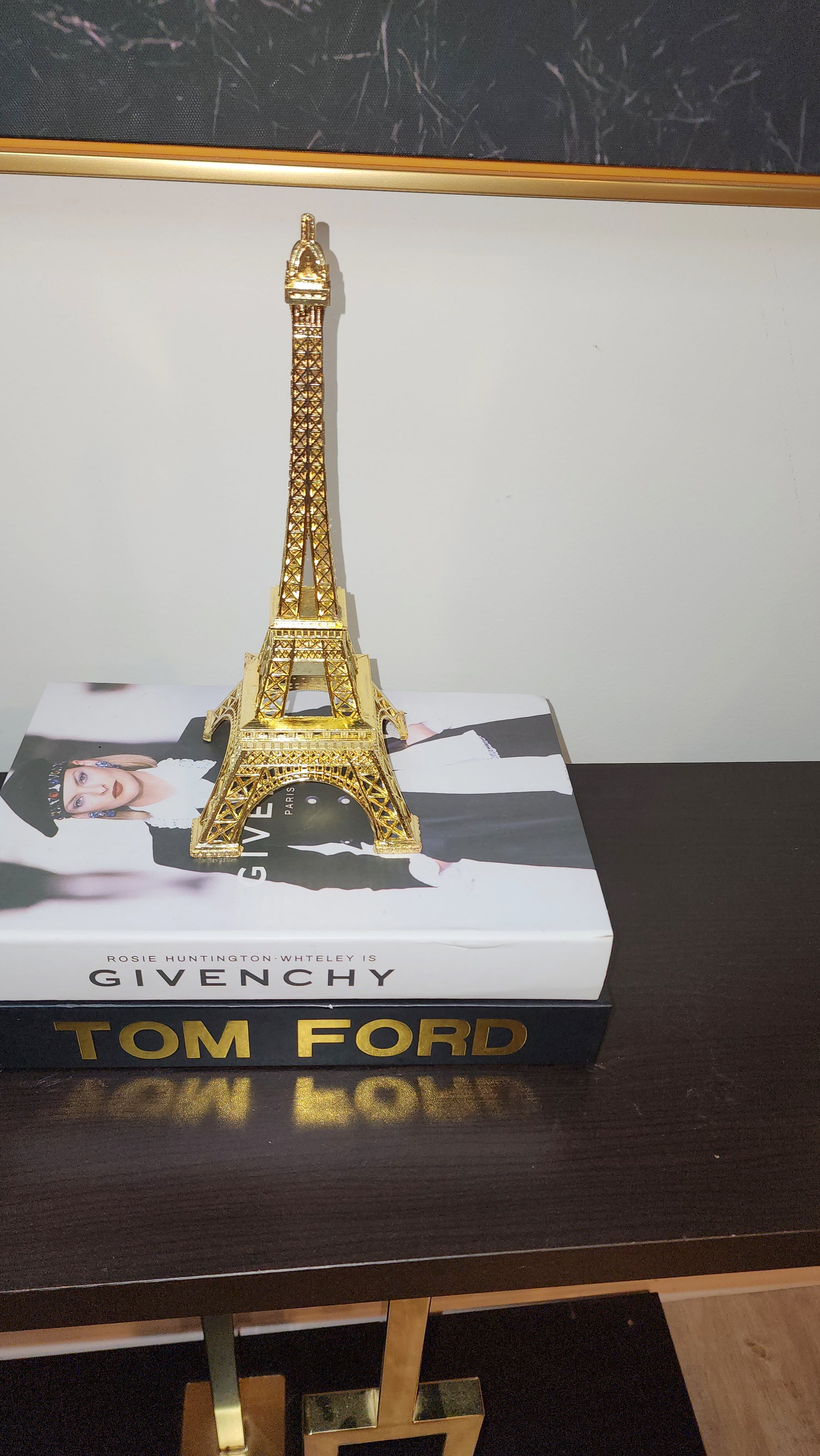 Eiffel Tower Gold Statue on books