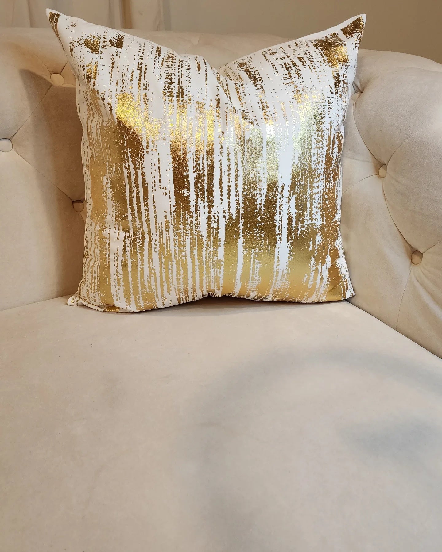 Luxury Gold and White Pillows 20*20 inches on a couch 